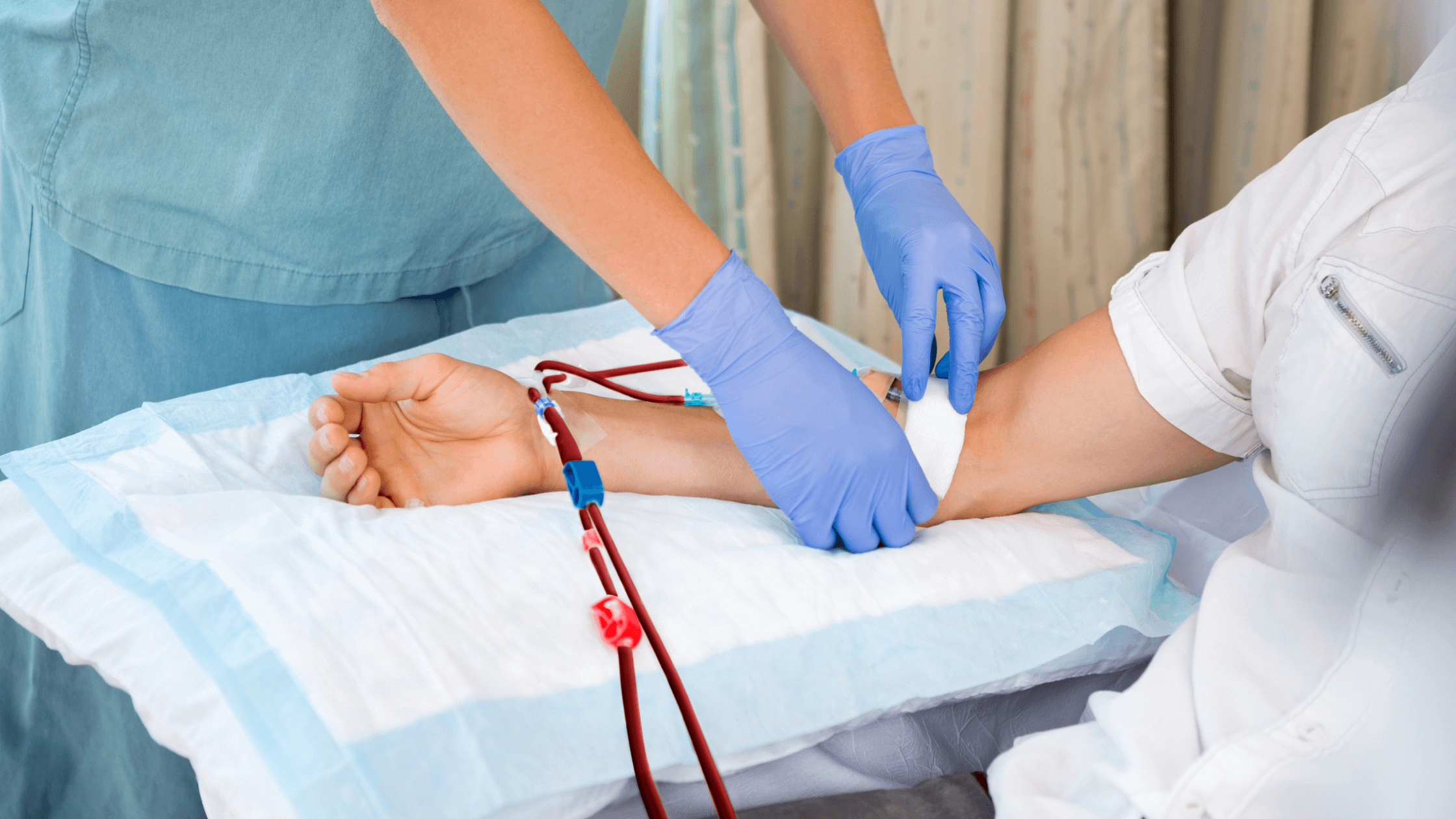Healthcare professional drawing blood during an in-home lab testing session. 